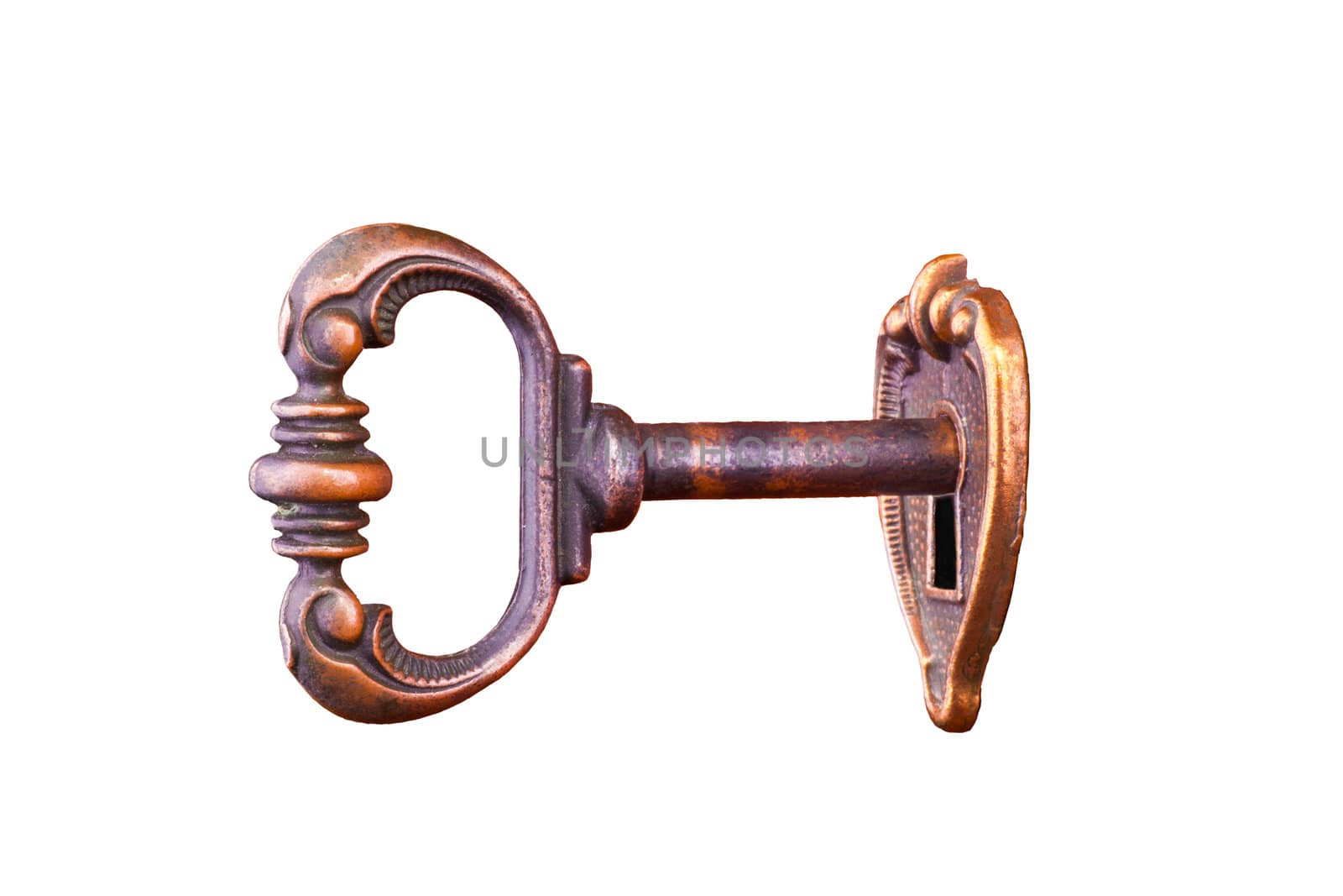 vintage key in keyhole isolated on white background