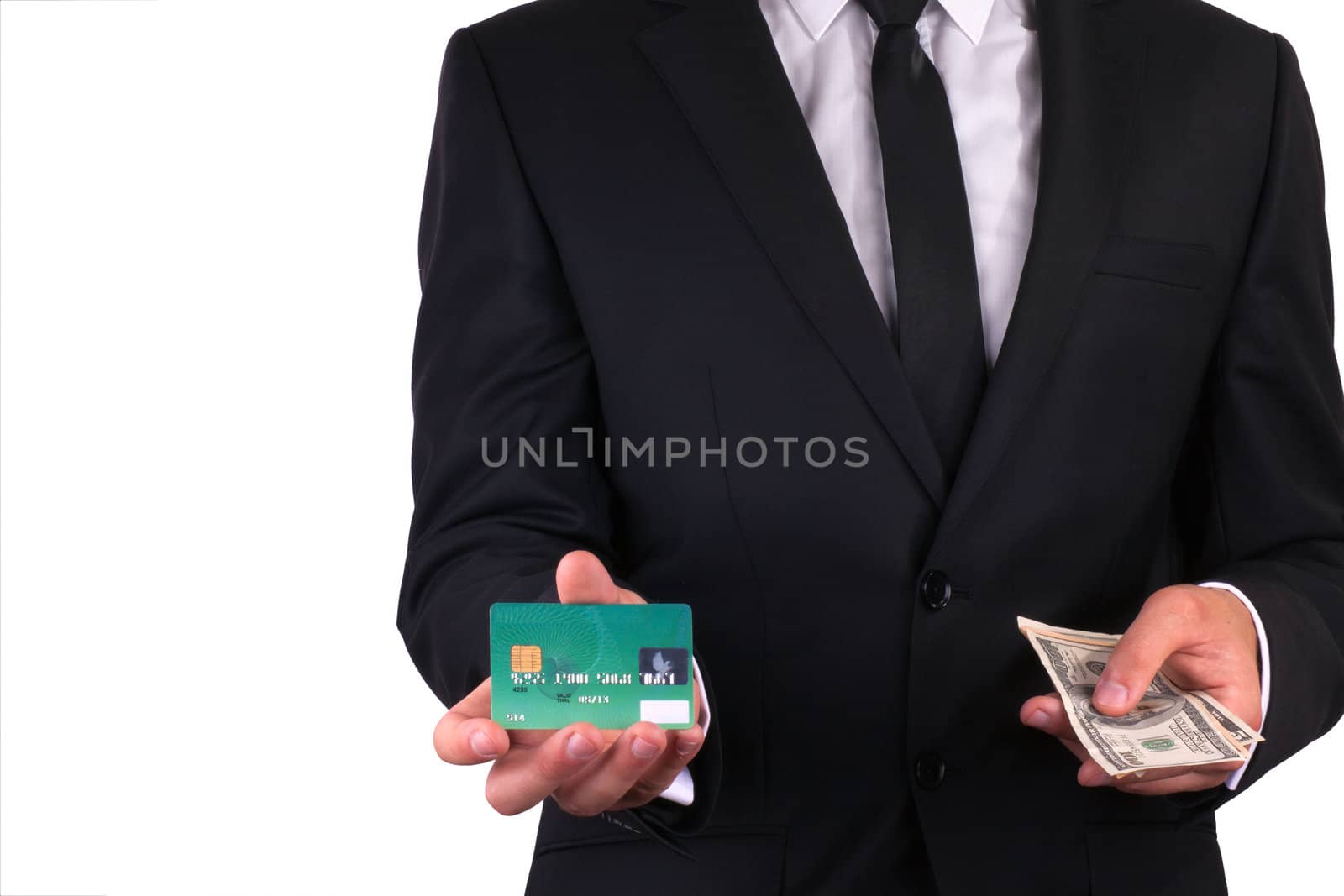 Businessman with credit card and money by georgenightingale