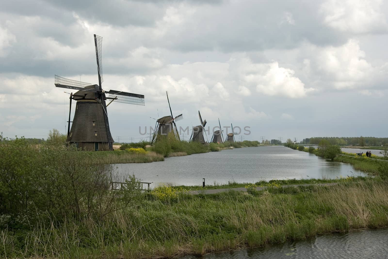 dutch windmills at kinderdijk by compuinfoto