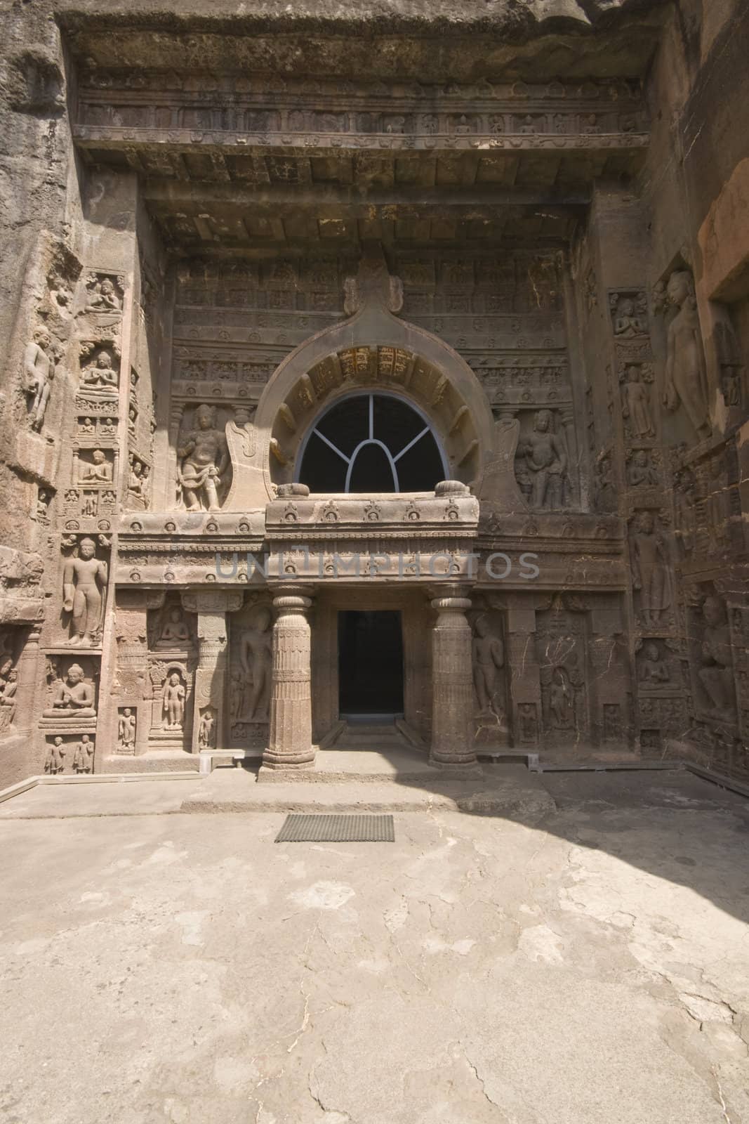Facade of ancient Buddhist rock temple  (cave 19), Ajanta Caves near Aurangabad, India. 5th-6th Century AD.