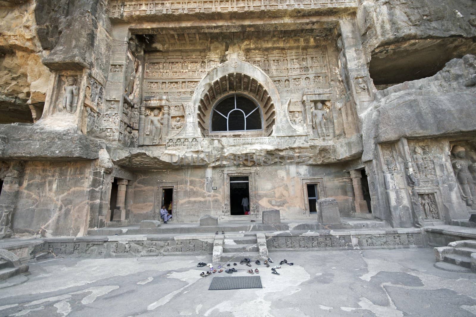 Facade of ancient Buddhist rock temple (Mahayan Chaitya-Griha Cave Temple) Cave 26 Ajanta near Aurangabad India. 5th-6th Century AD.