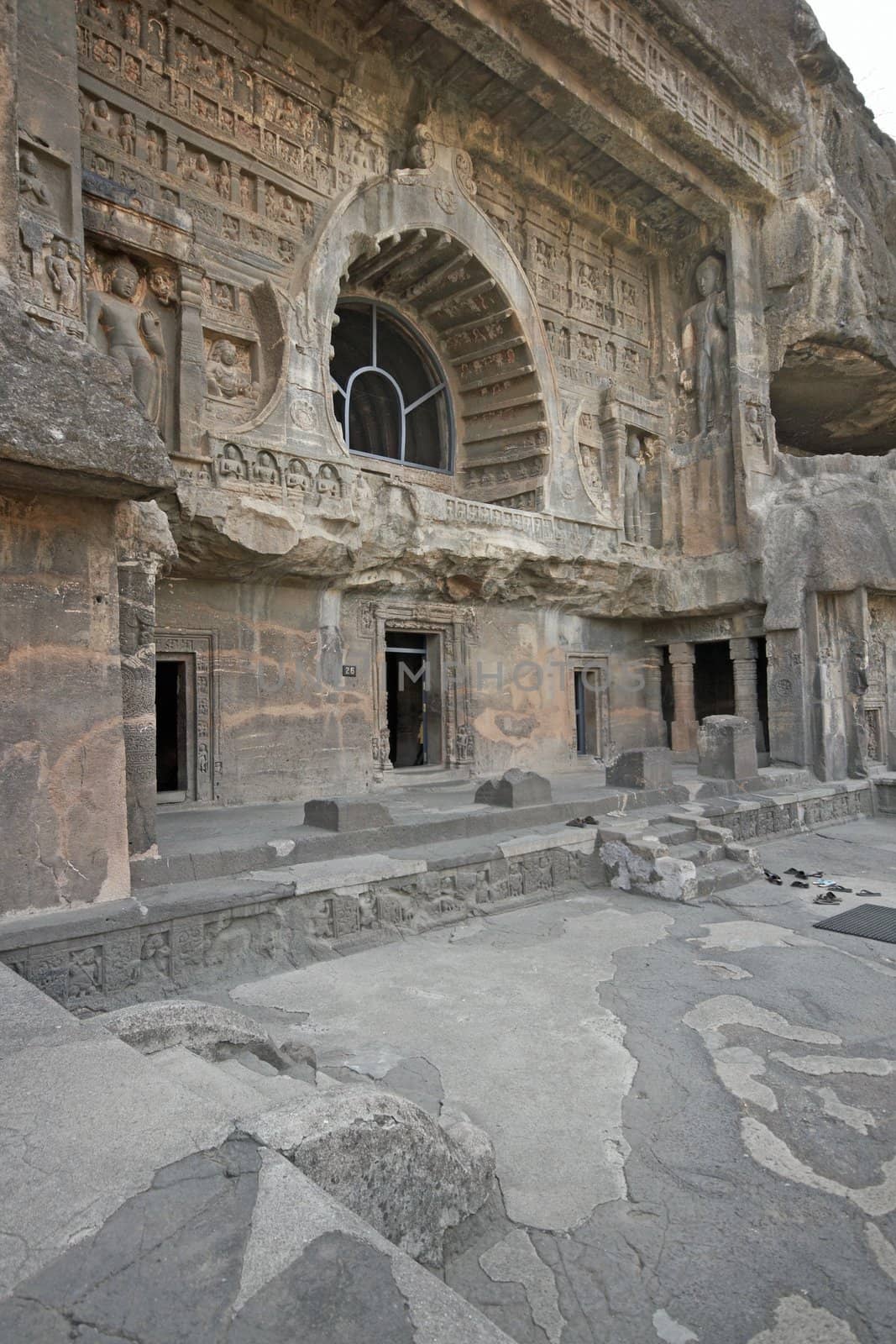 Facade of ancient Buddhist rock temple (Mahayan Chaitya-Griha Cave Temple) Cave 26 Ajanta near Aurangabad India. 5th-6th Century AD.