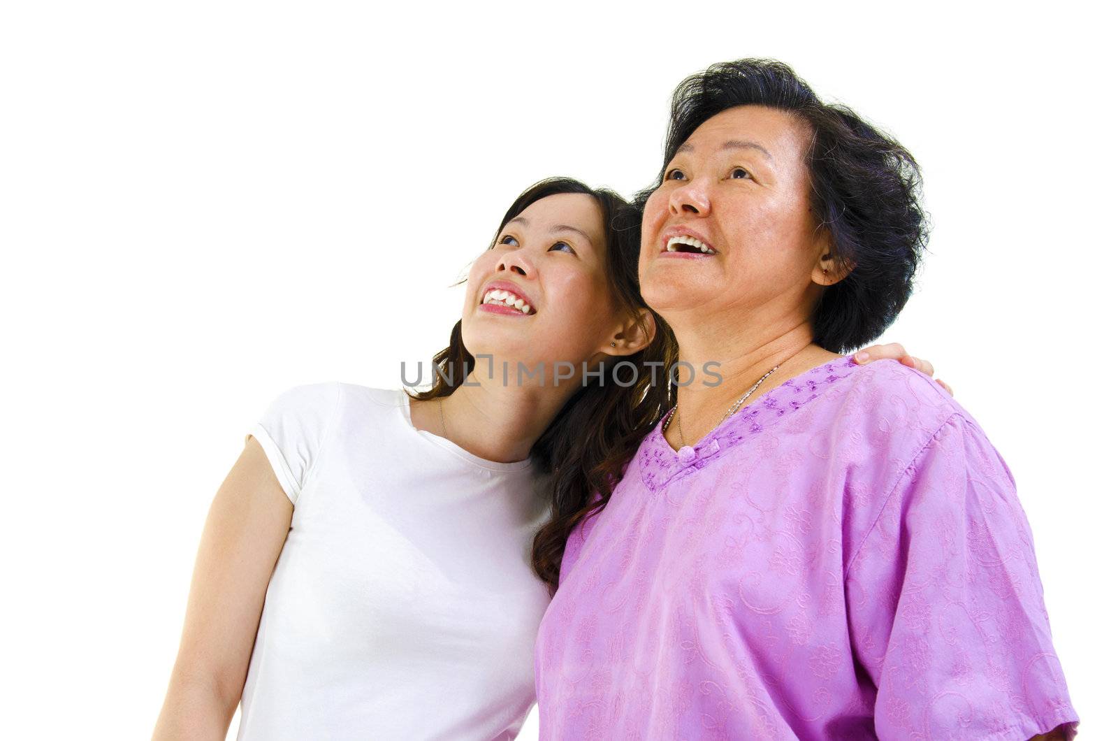 Senior Asian woman and young daughter looking away with smiling, on white background.