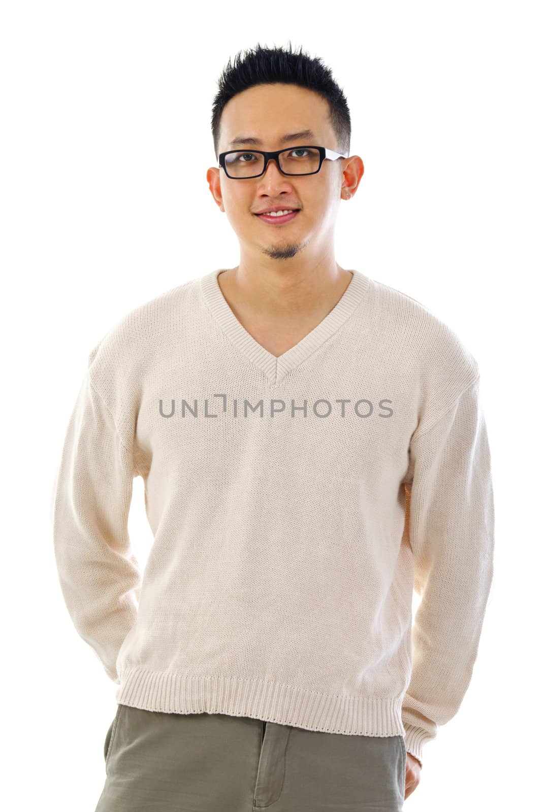 Handsome Asian male standing over white background
