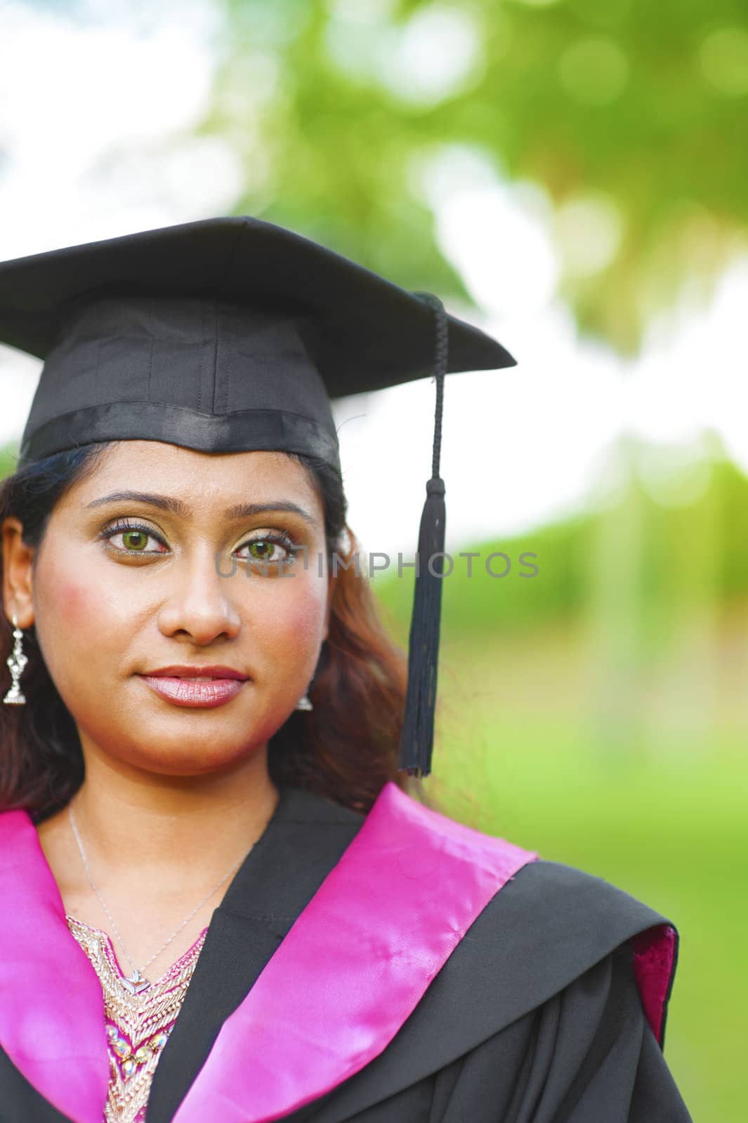 Young Asian Indian female smiling outdoor