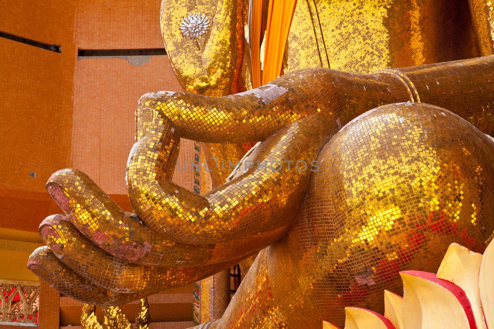 hand of buddha in buddhist temple in kanchanaburi, thailand