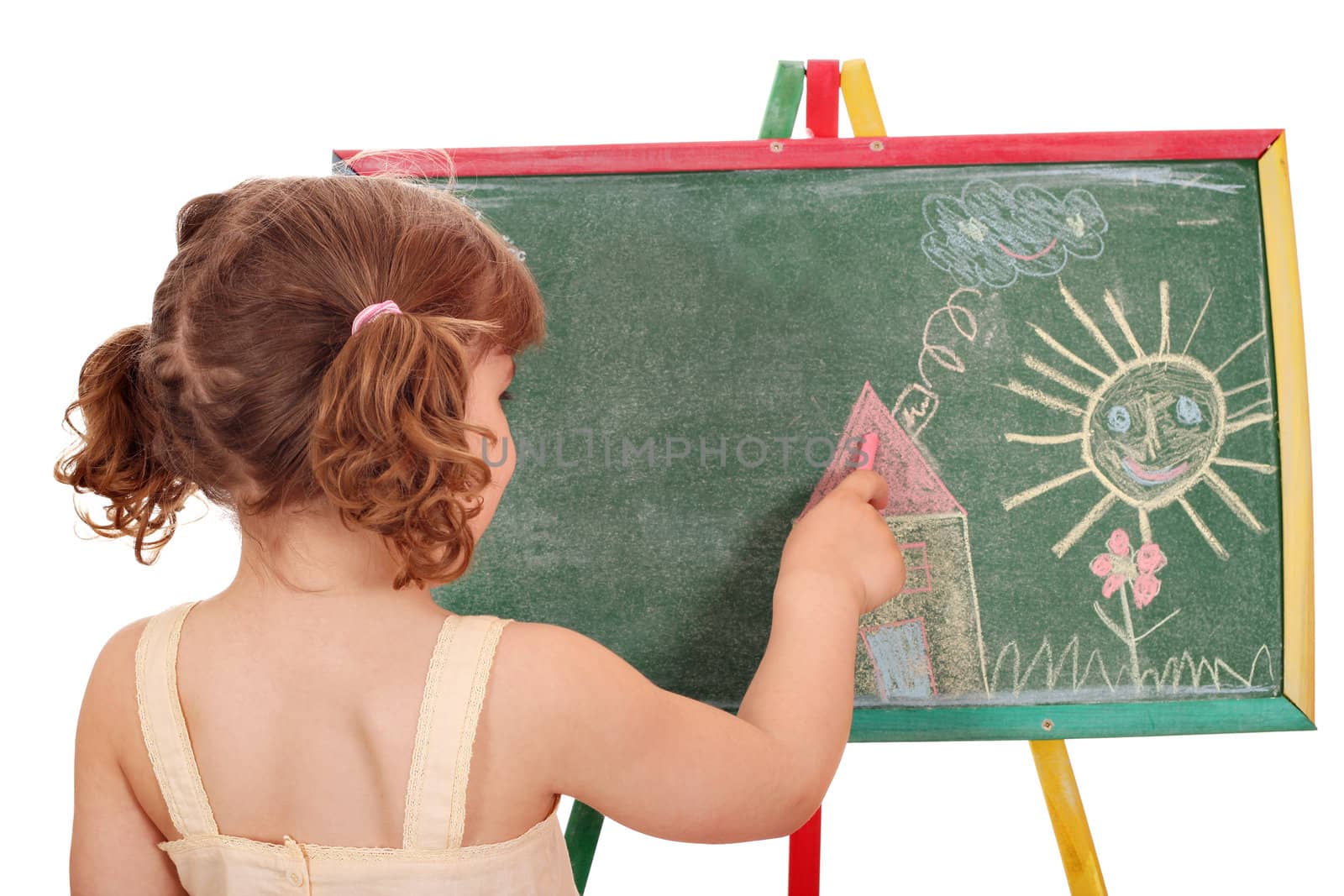 little girl drawing on board