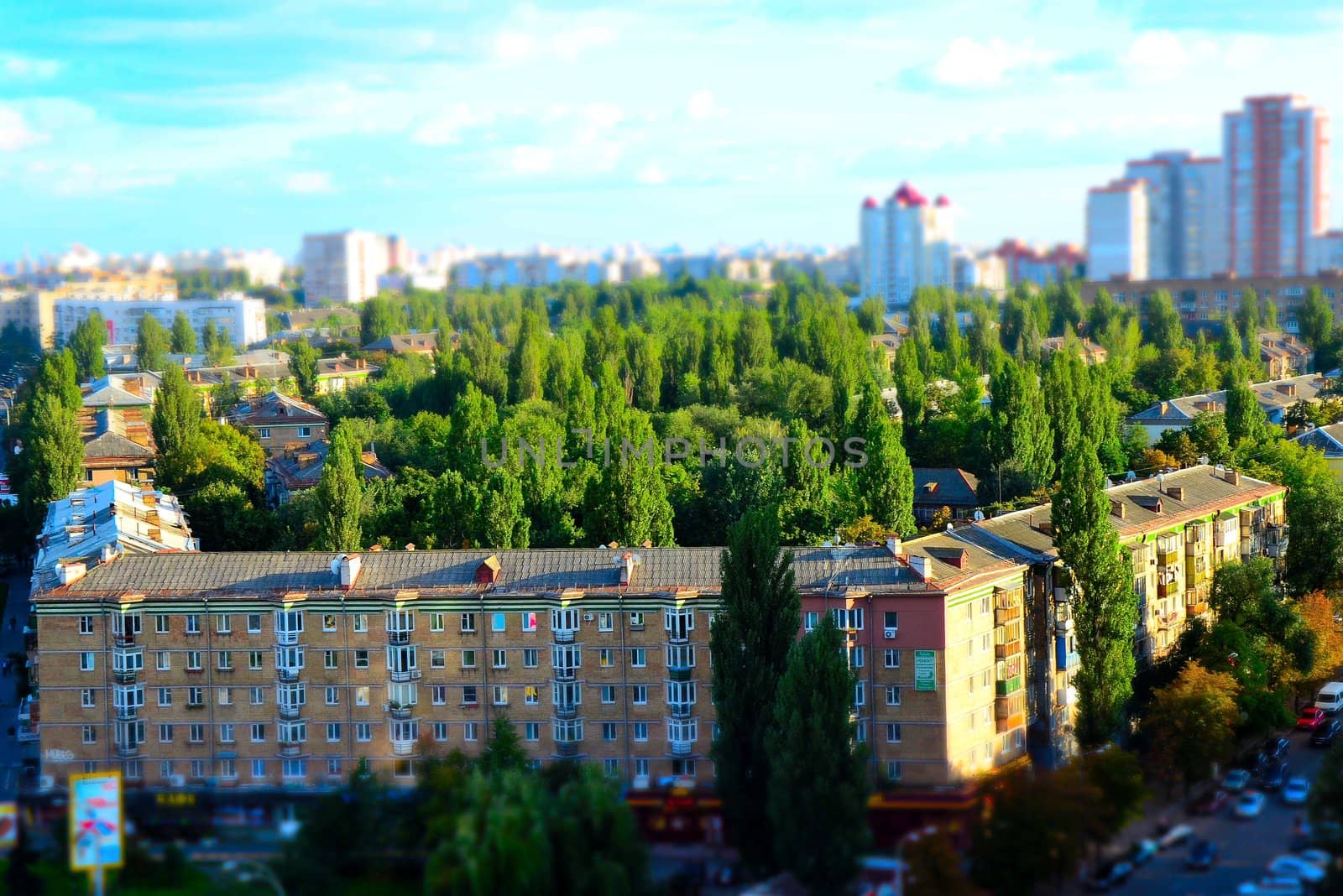 Macro city with building and green trees