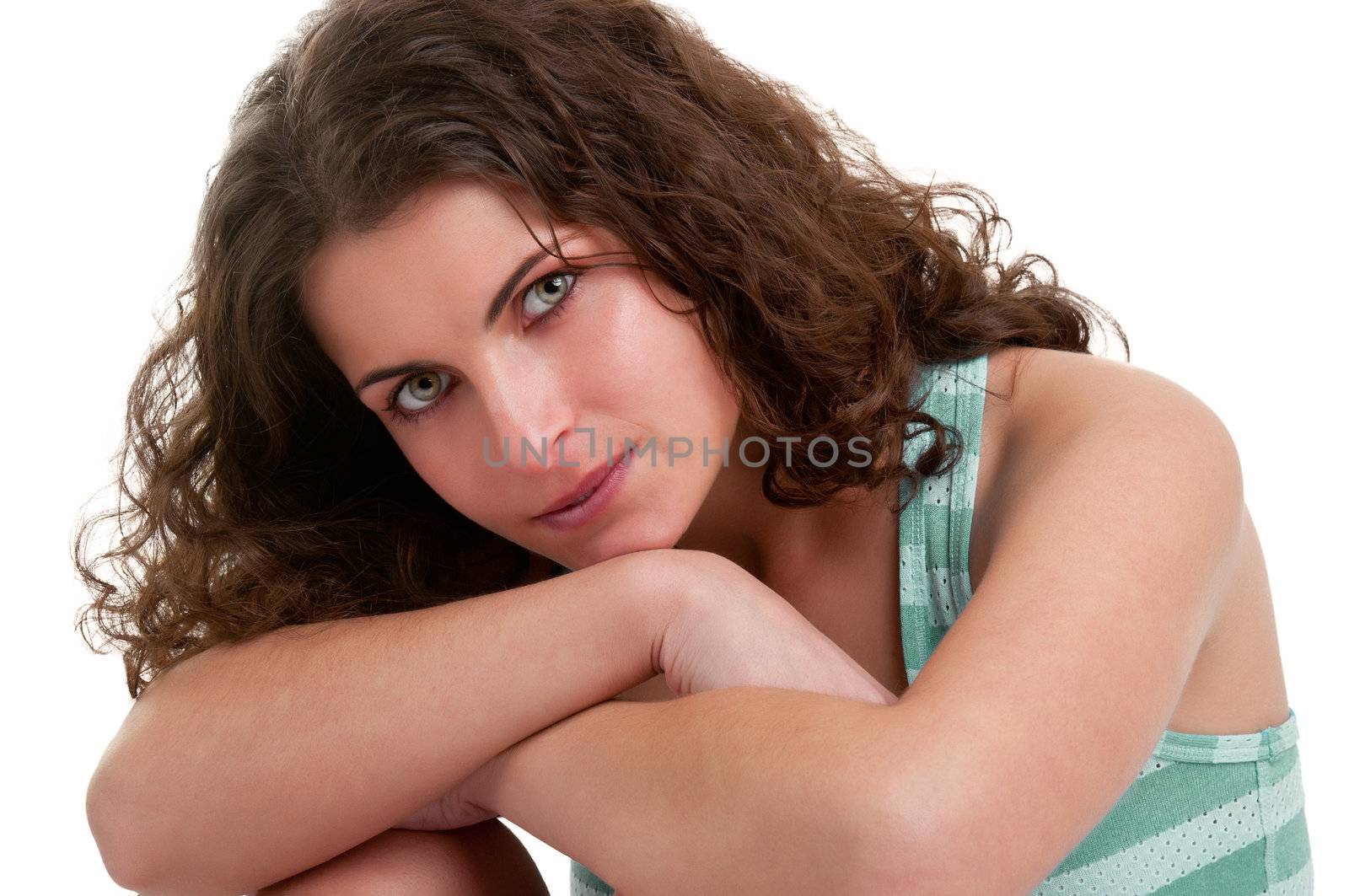 Woman sitting on the floor, resting, isolated in a white background