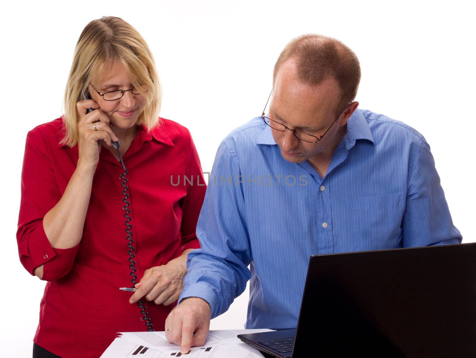 Two business people working