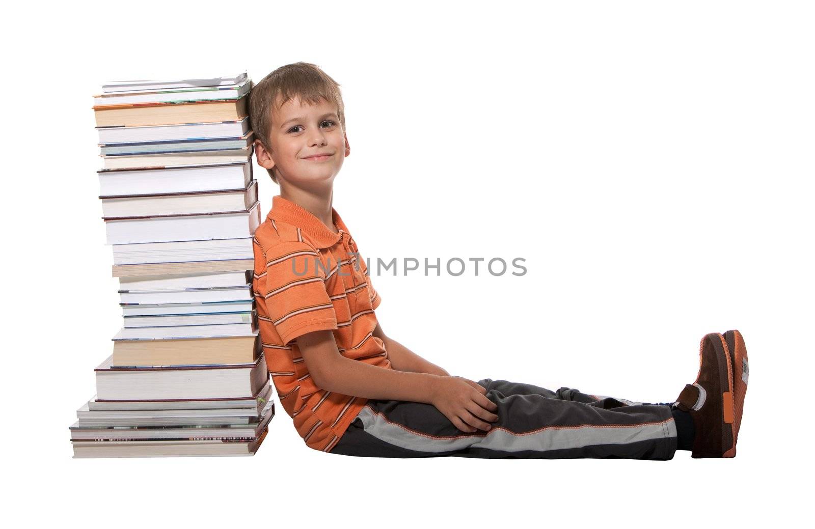 Boy and books isolated on a white background