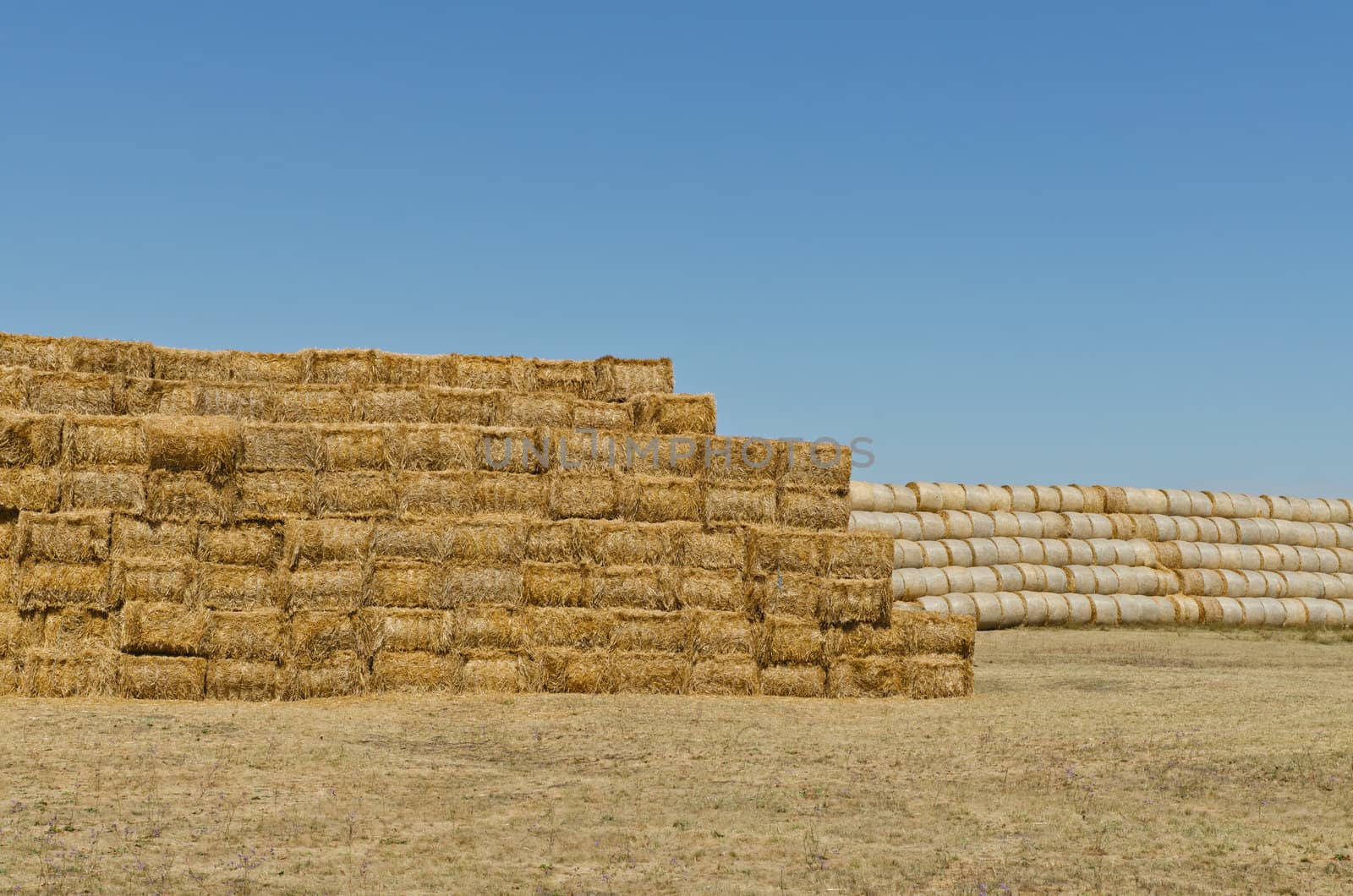 a stack of hay bales, horizontal shot