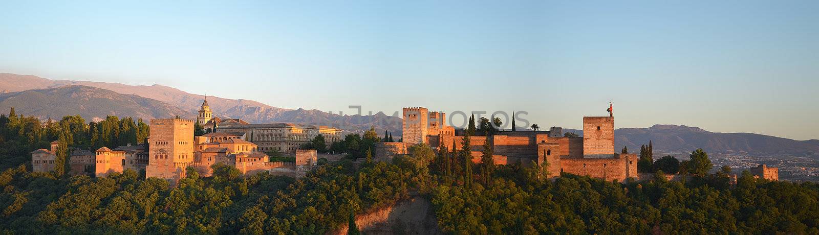 View of the Alhambra complex in Granada, Spain, at dusk