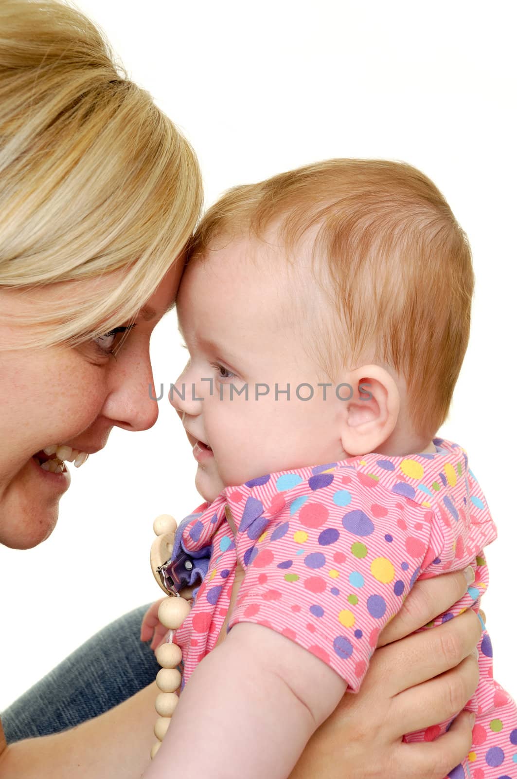 Mother and baby are smiling by cfoto