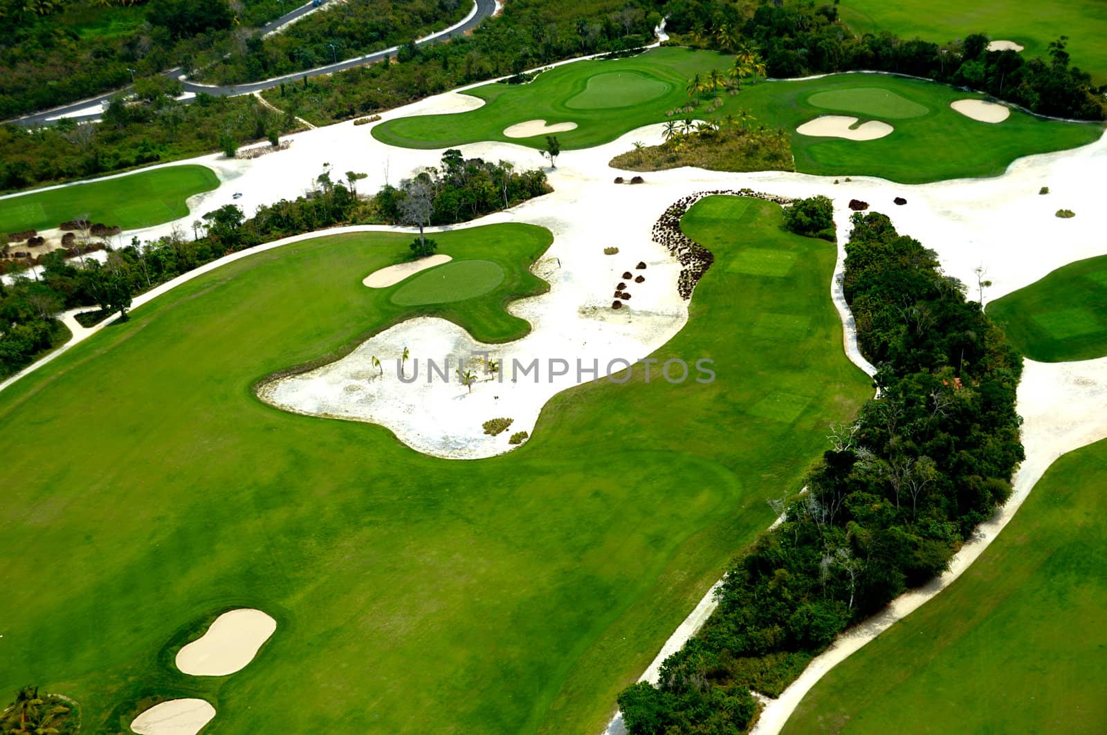 Flying above a golf course at an exotic destination