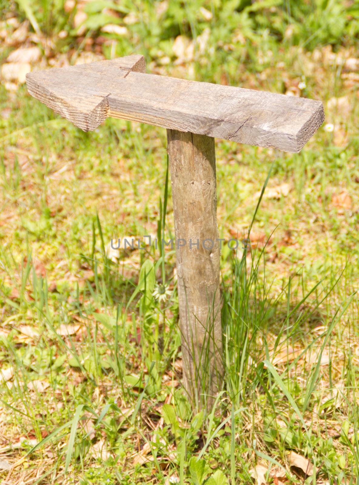 Wooden marker showing a route