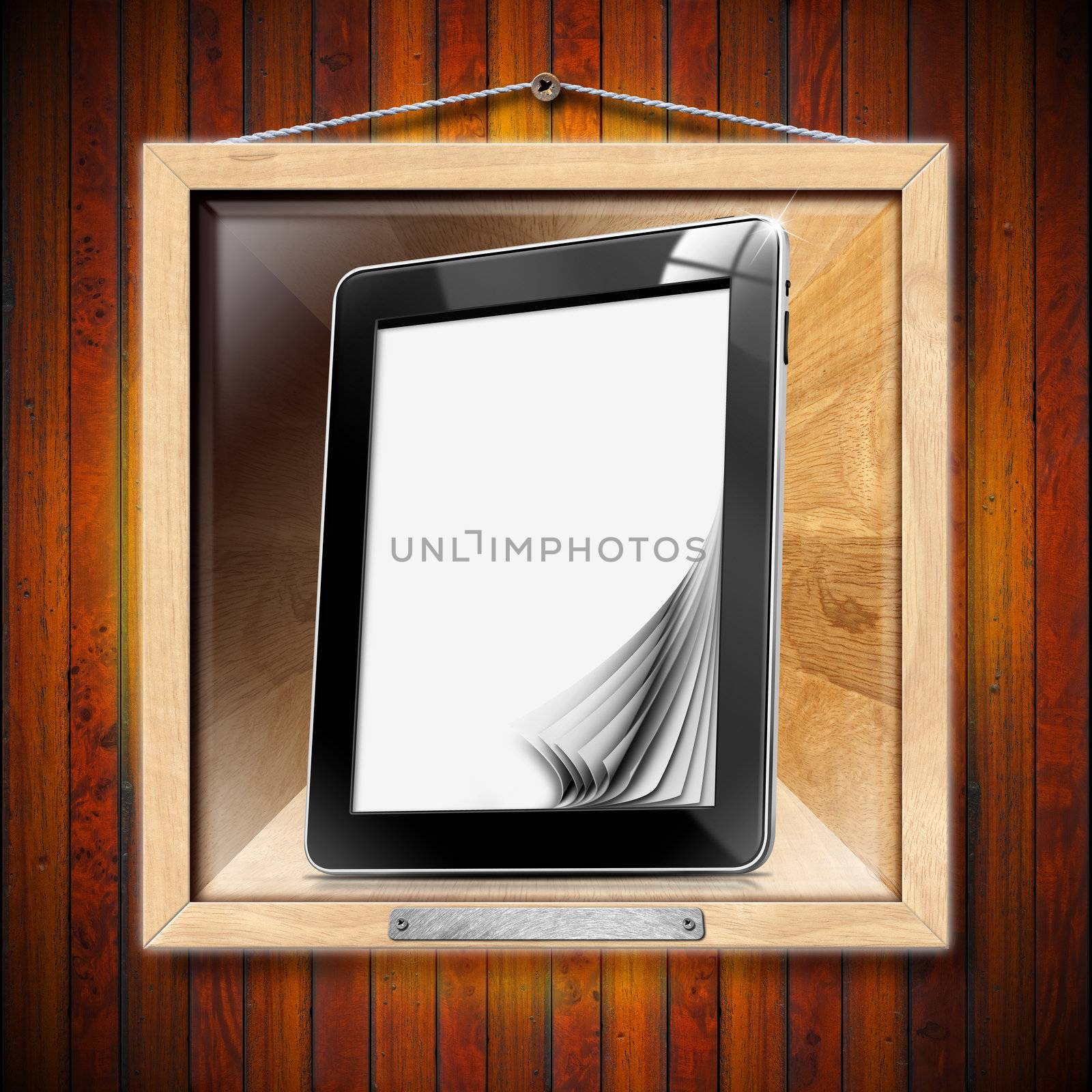 Black tablet computer with blank pages on wooden frame

