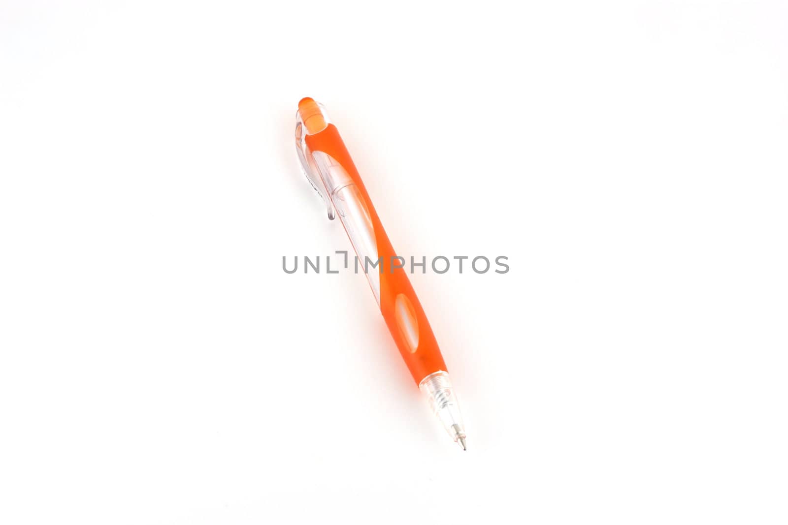 Orange ball-point pen over white by sergpet