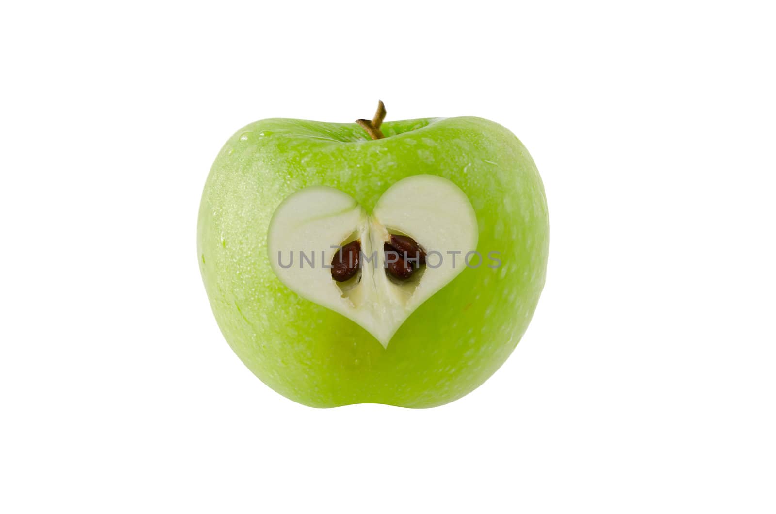  apple with heart shape cut on white background