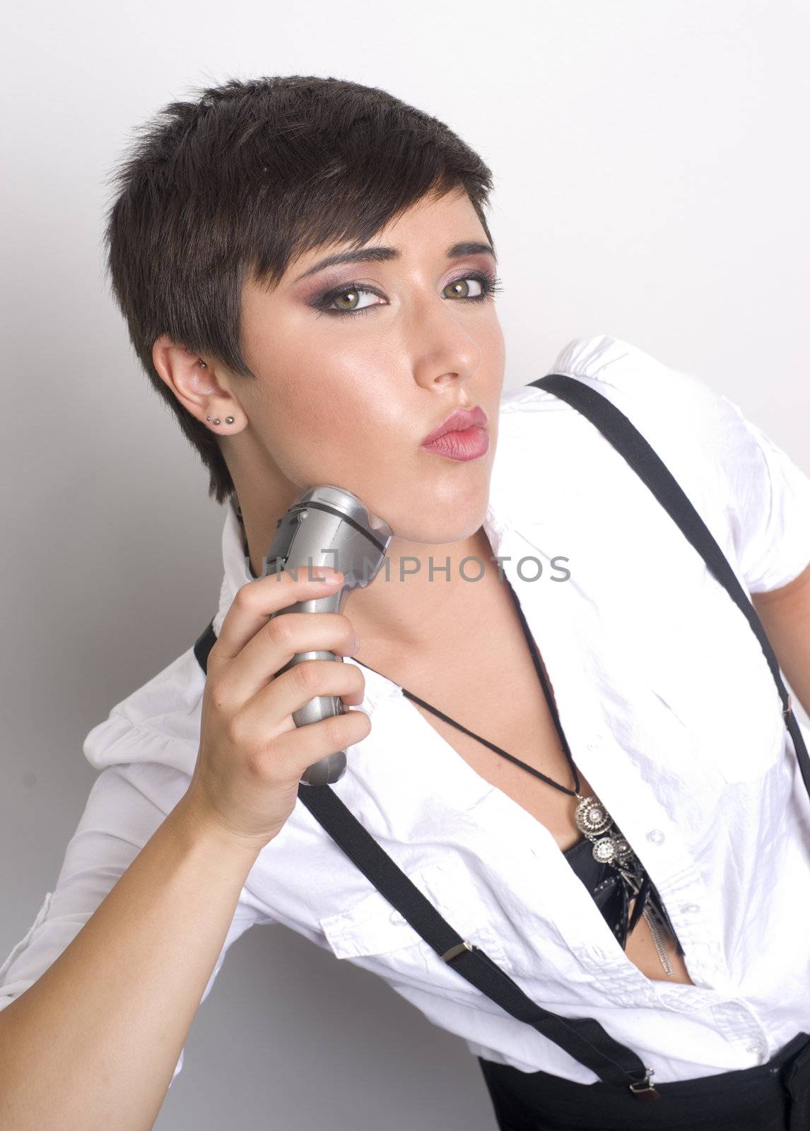 Woman using an electric shaver