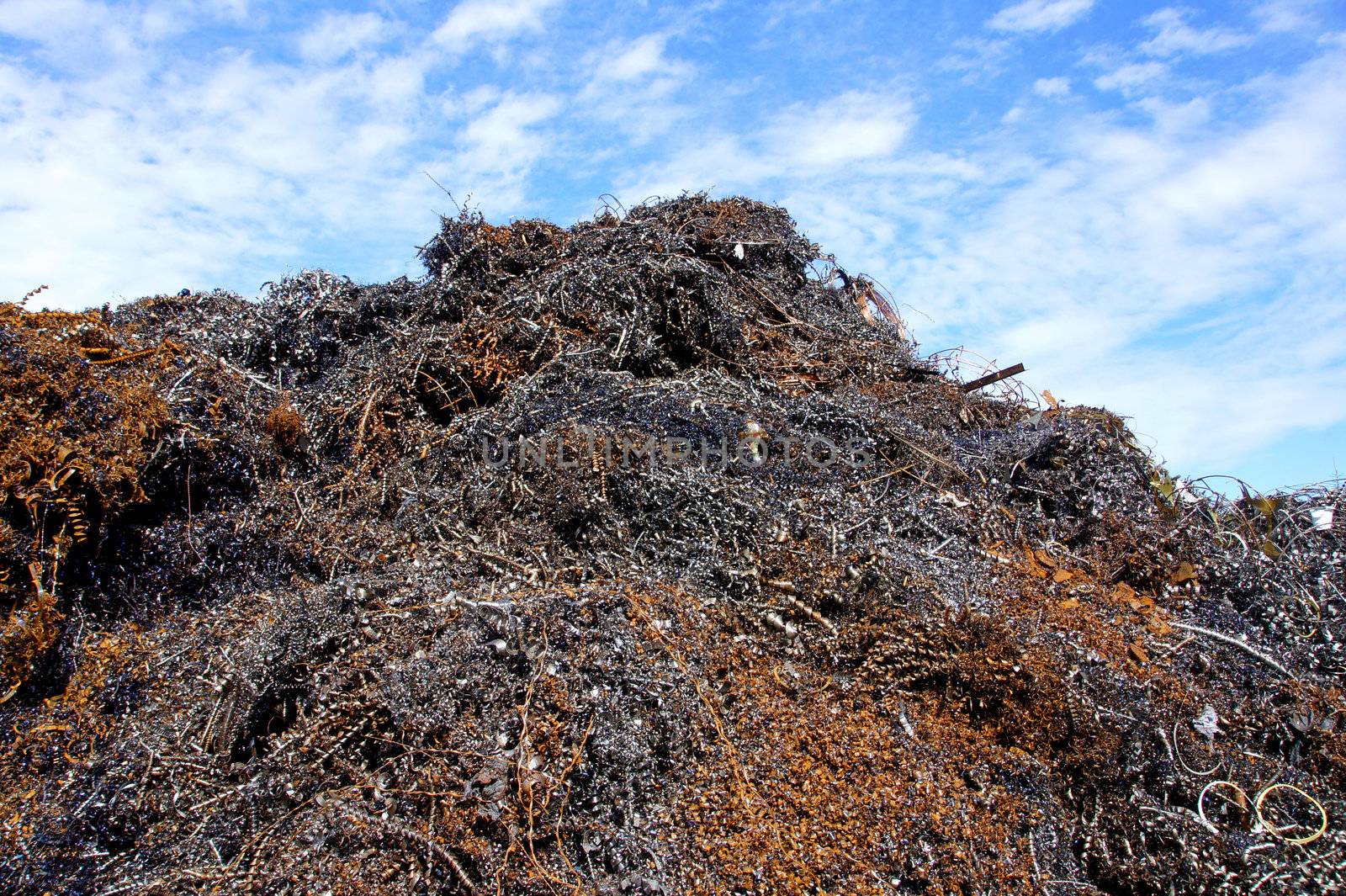 Greater mountain of an old rusty metal shaving