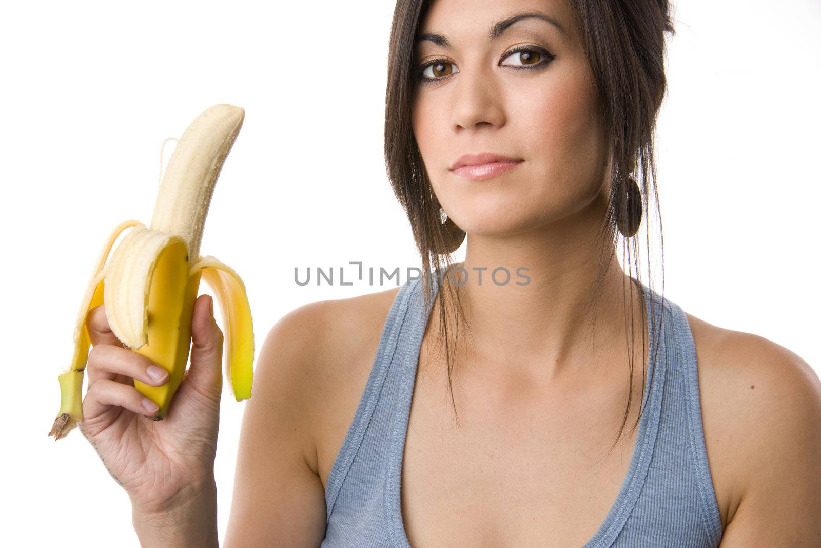 Beautiful Brunette holds a Banana
