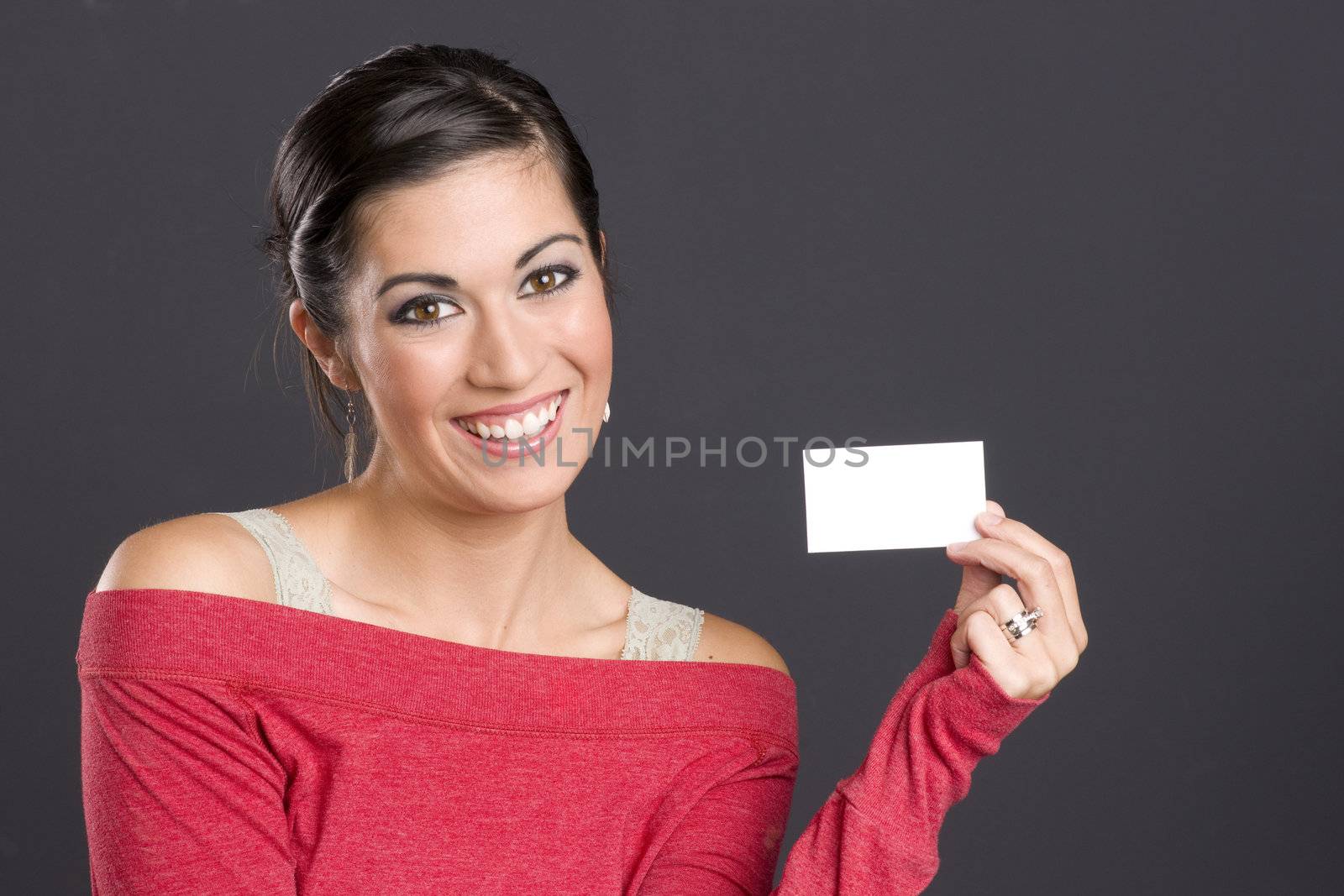 Pretty Woman holds a business card