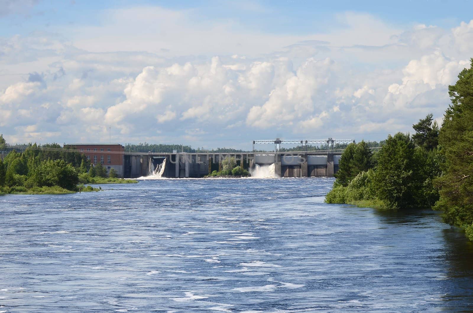 A hydroelectric power station with two dust flaps open