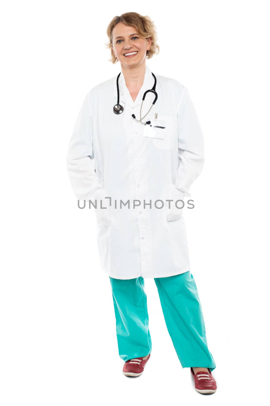 Attractive senior doctor posing casually isolated over white background
