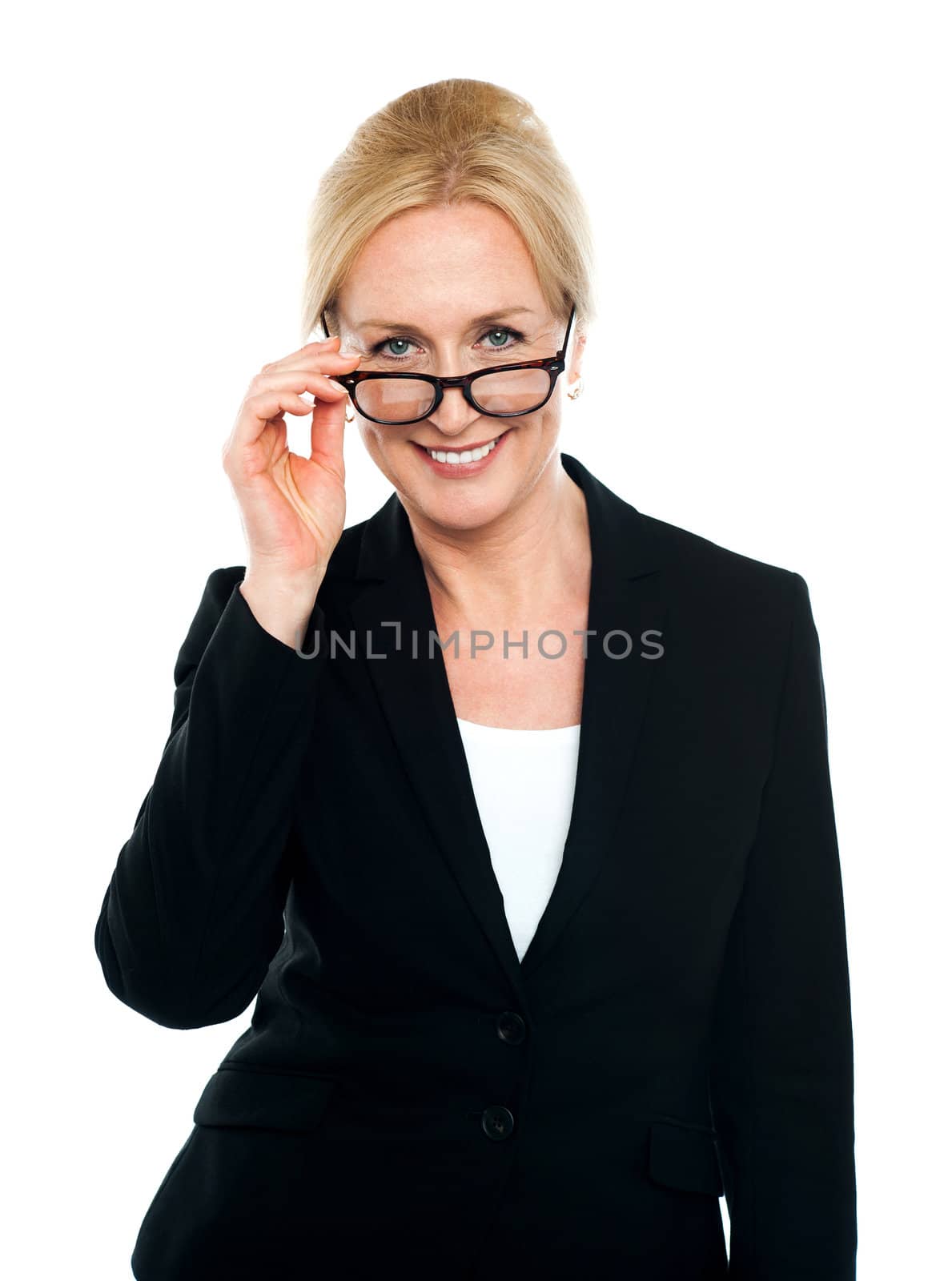 Female secretary holding her glasses and taking a closer look at you