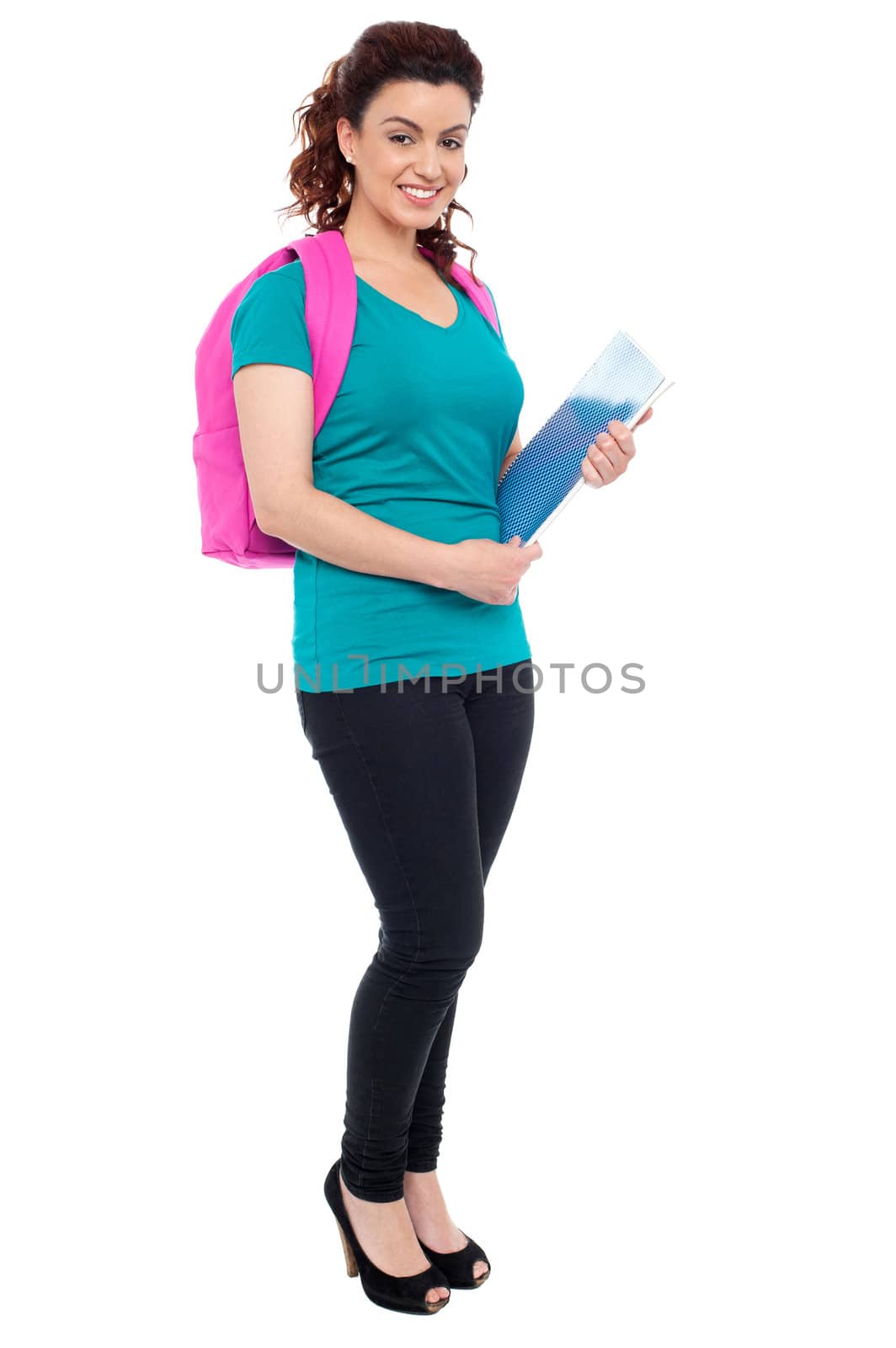 Attractive student with backpack and spiral notebook. Full length portrait