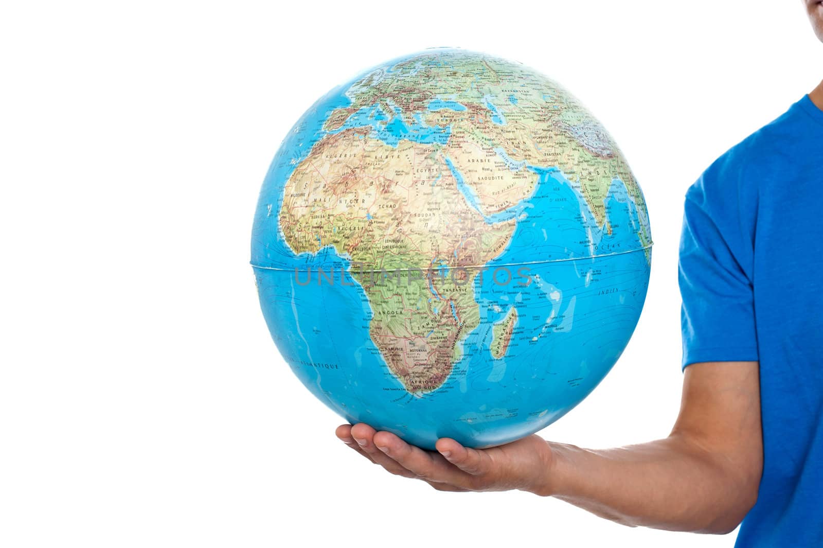 Cropped image of man holding globe over white background