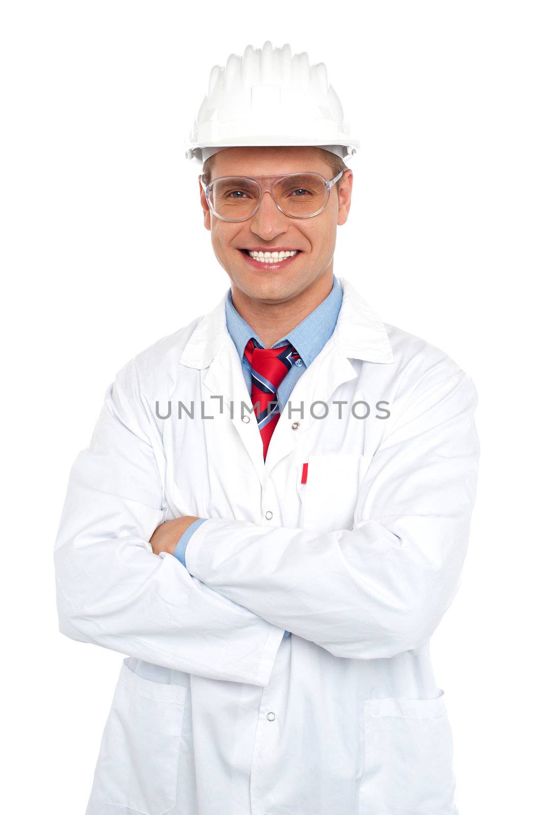 Male architect wearing safety glasses and hard hat. Dressed in white uniform  with arms folded