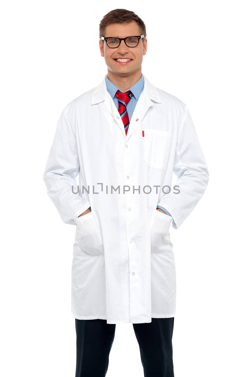 Stylish portrait of handsome male doctor posing with hands in pocket