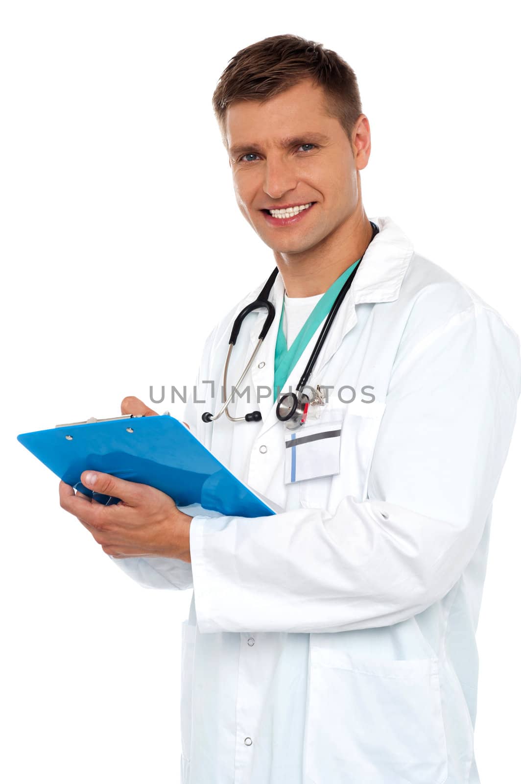 Smiling young doctor writing on clipboard isolated against white background