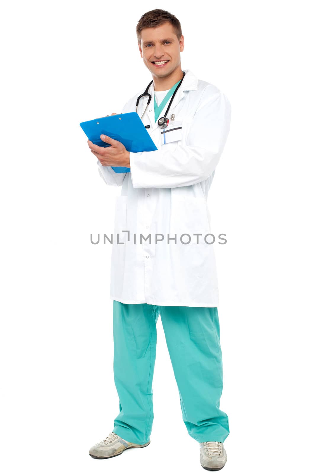 Full length of portrait smiling doctor with clipboard standing against white background