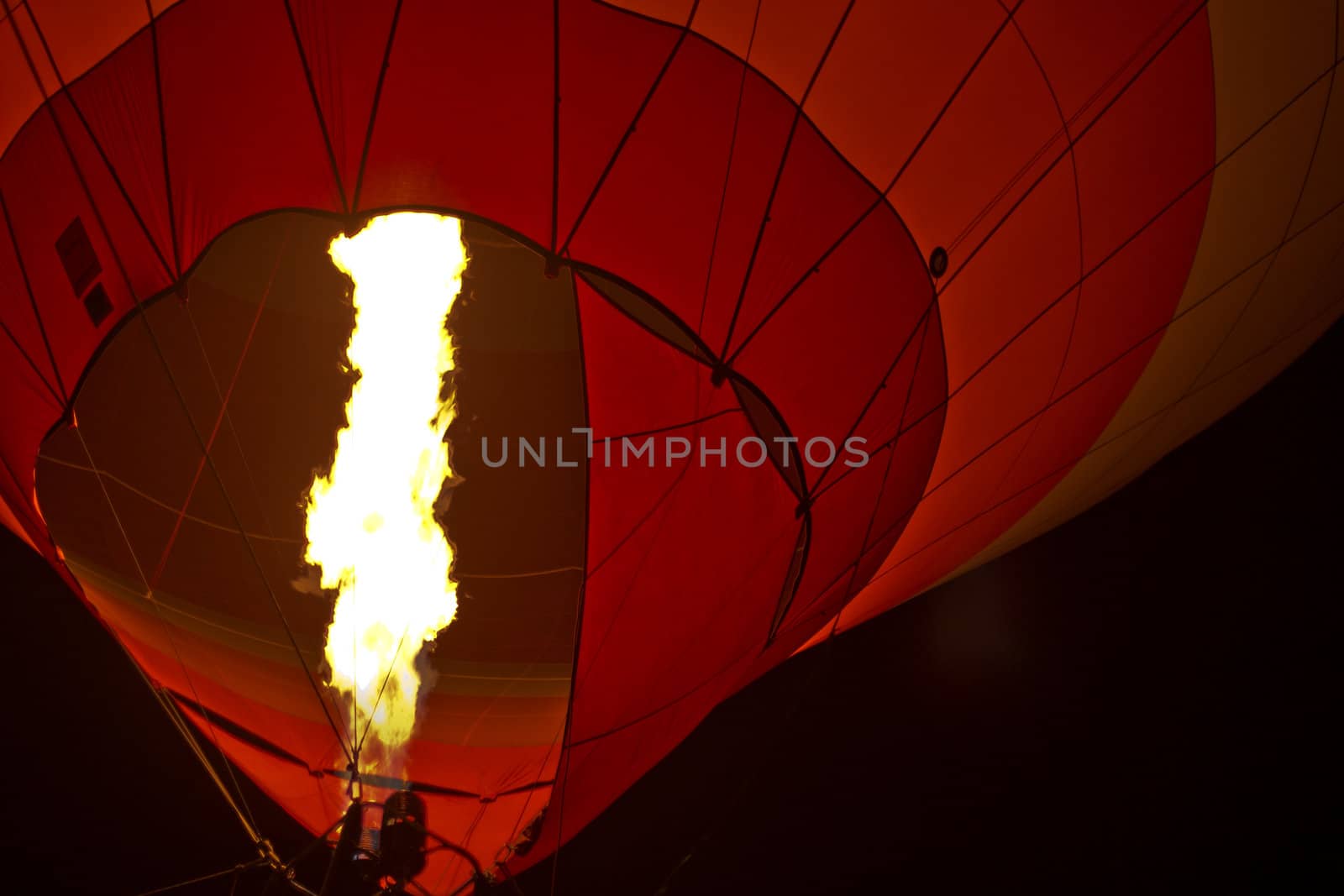 fine hot air balloon flying in the night sky