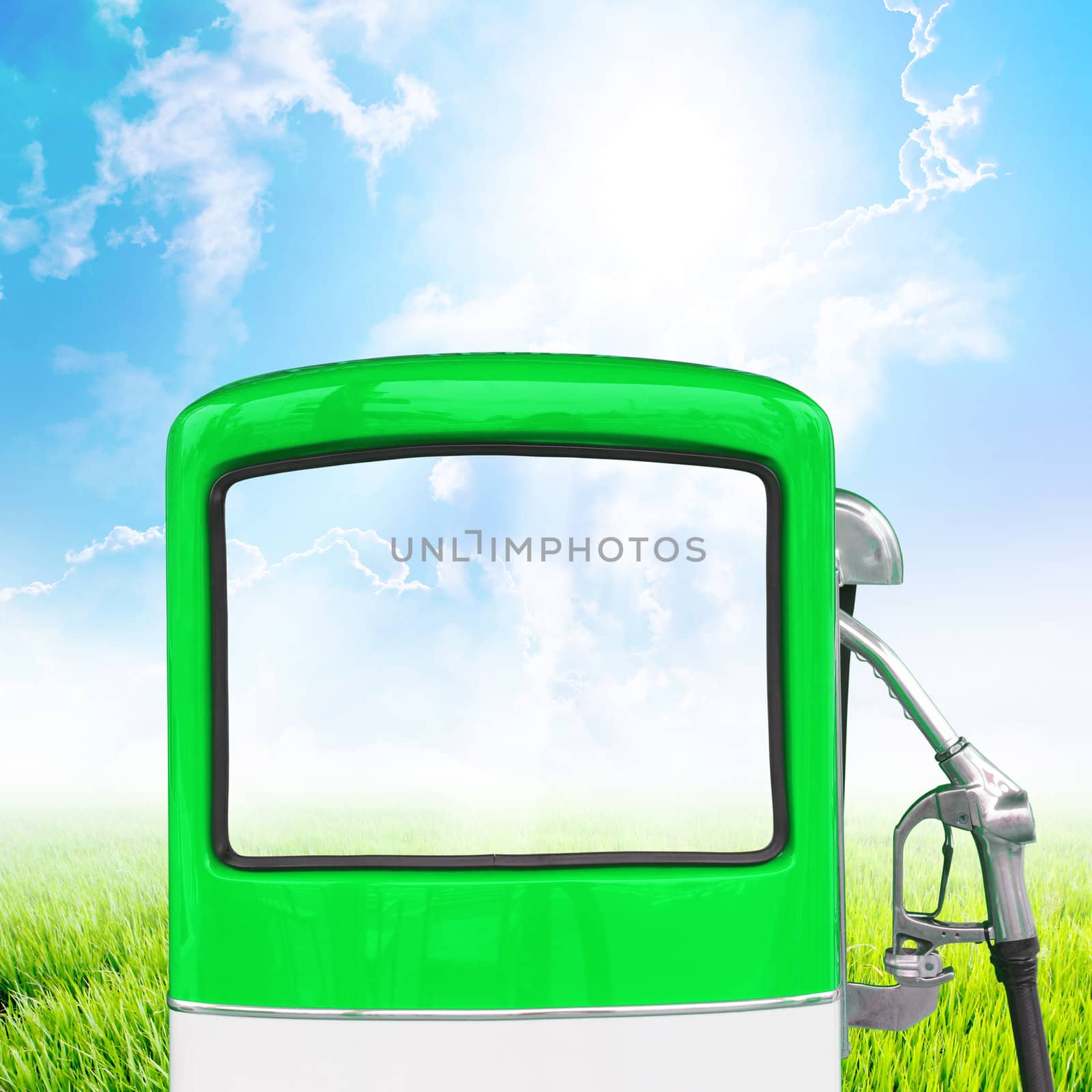 Green gasoline fuel pump ecology concept with landscape background, clipping path 