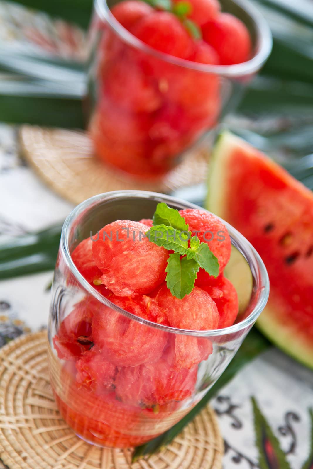Watermelon scoop in glasses with mint