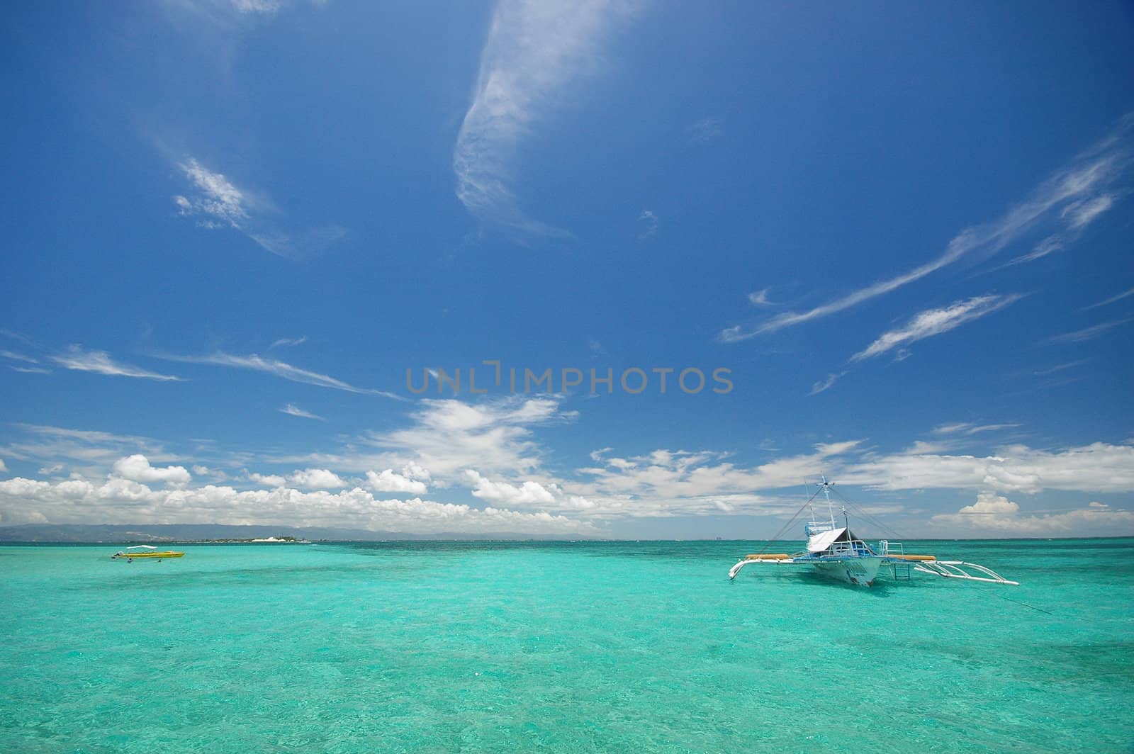 Turquoise sea with blue sky