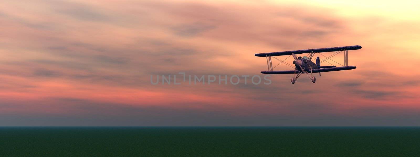 Old biplan flyinig upon the ground by colorful cloudy sunset