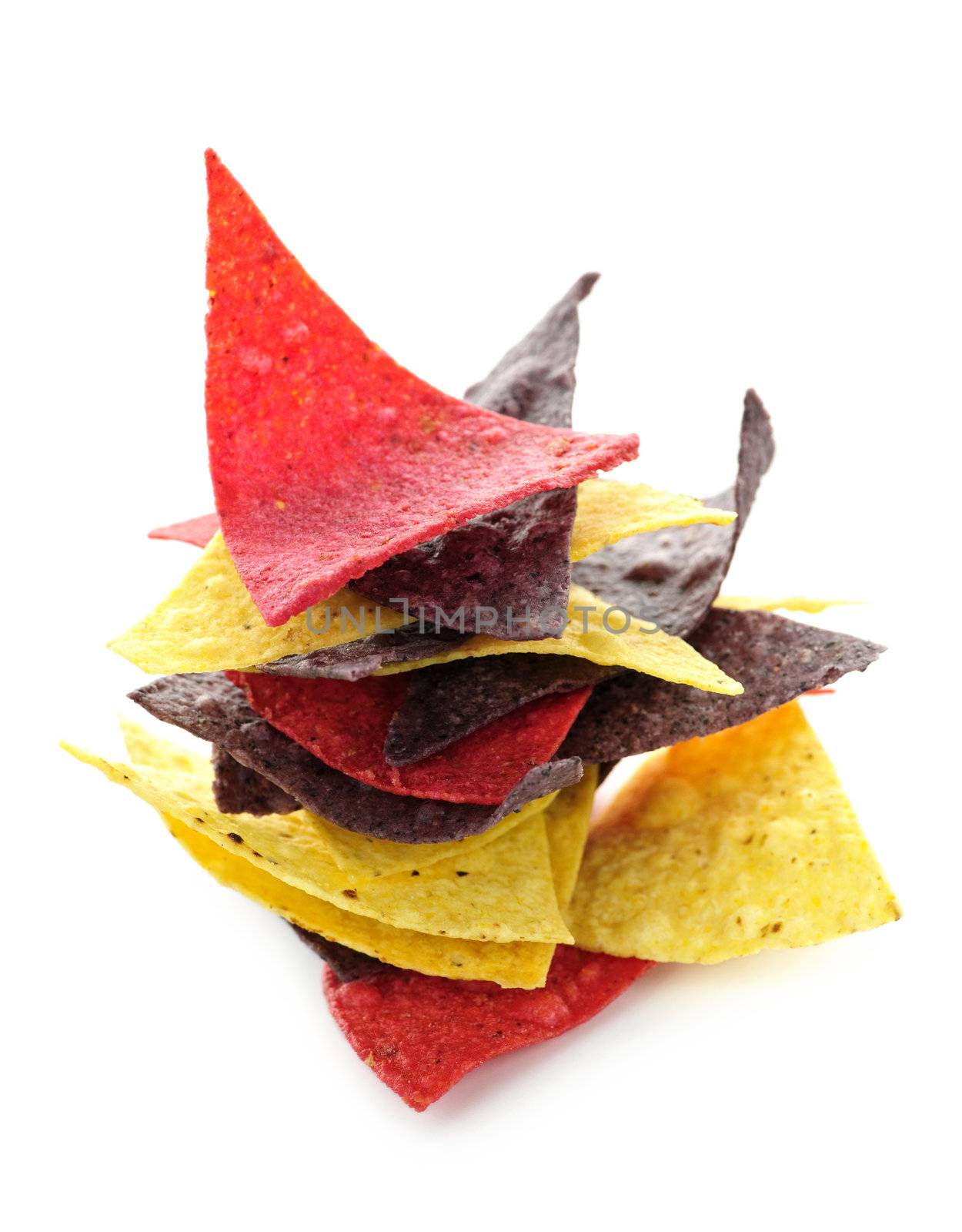 Stack of colorful tortilla chips isolated on white background