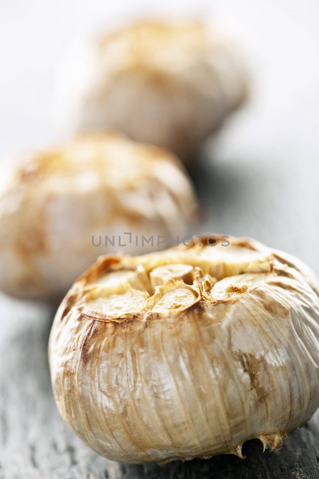 Close up of fresh roasted garlic bulbs