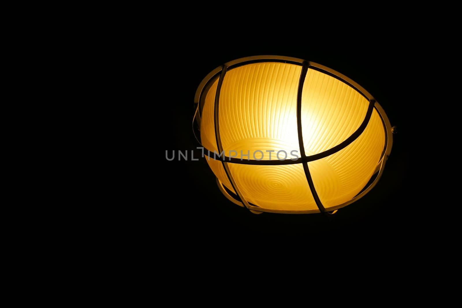 Yellow lantern duty lighting isolated on a black background