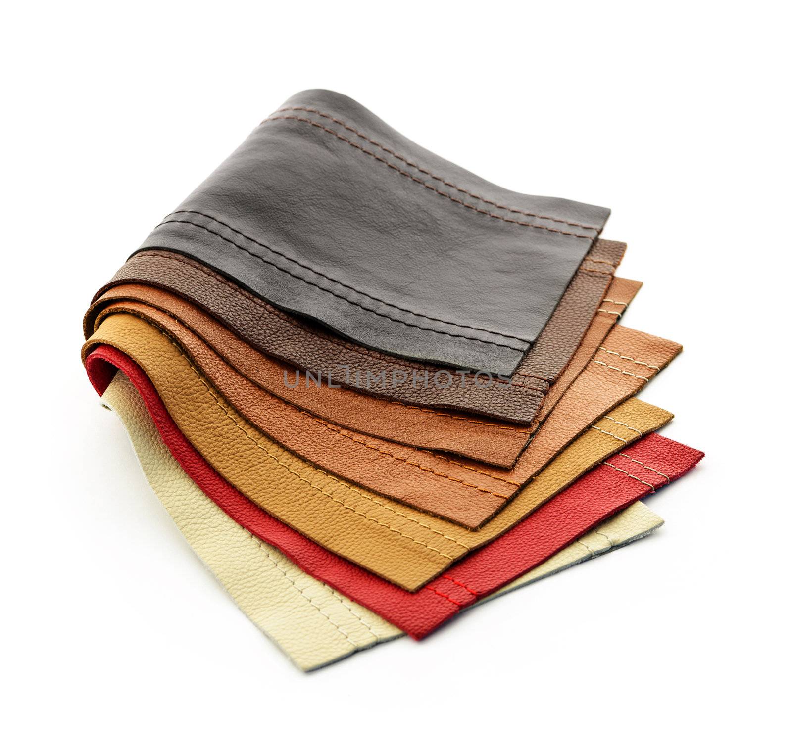 Leather upholstery samples with stitching in various colors isolated