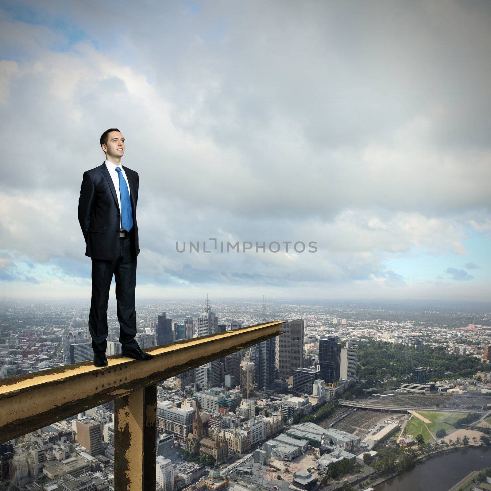 Businessman and cityscape by sergey_nivens
