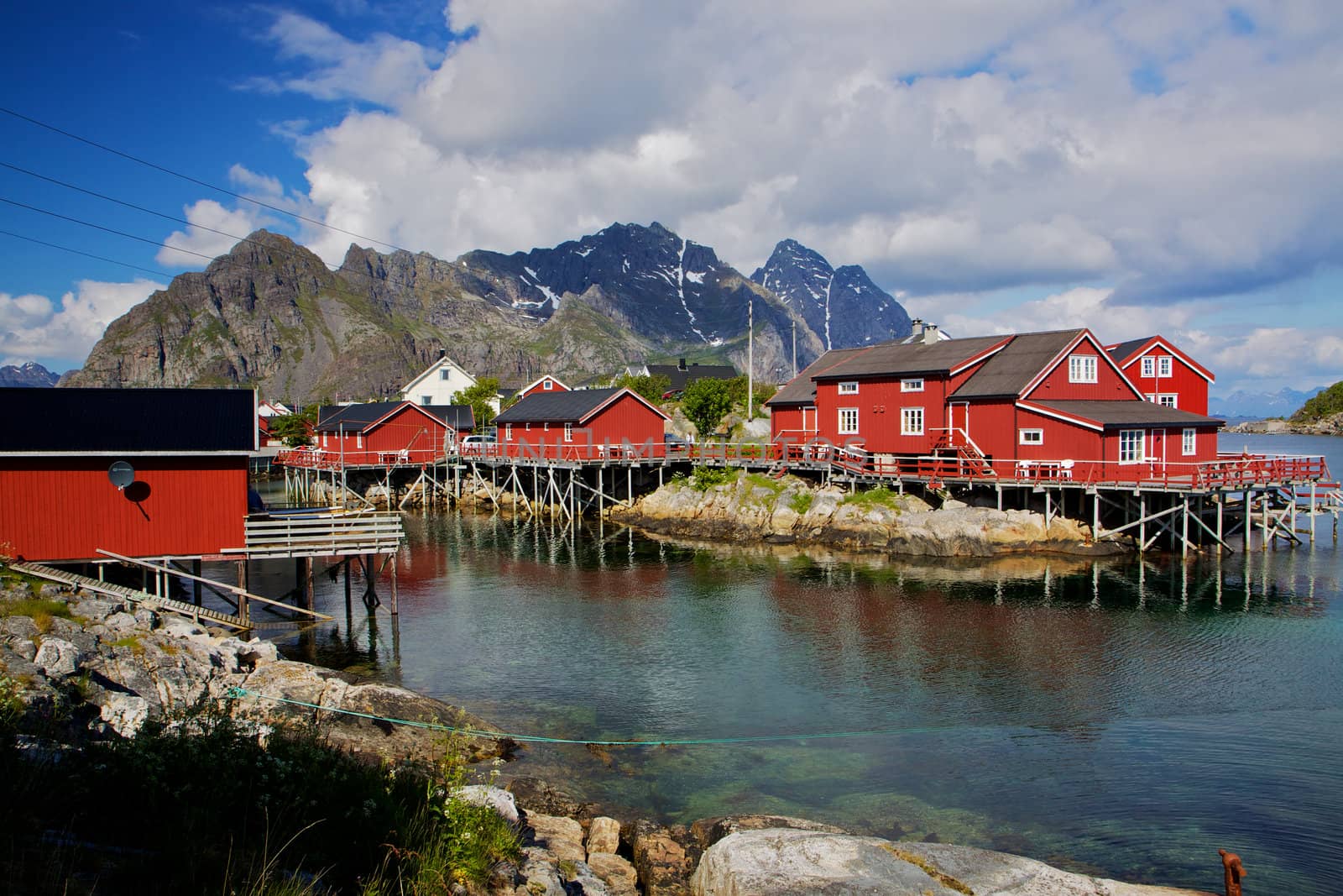 Typical red fishing huts called Rorbu on Lofoten islands in Norway