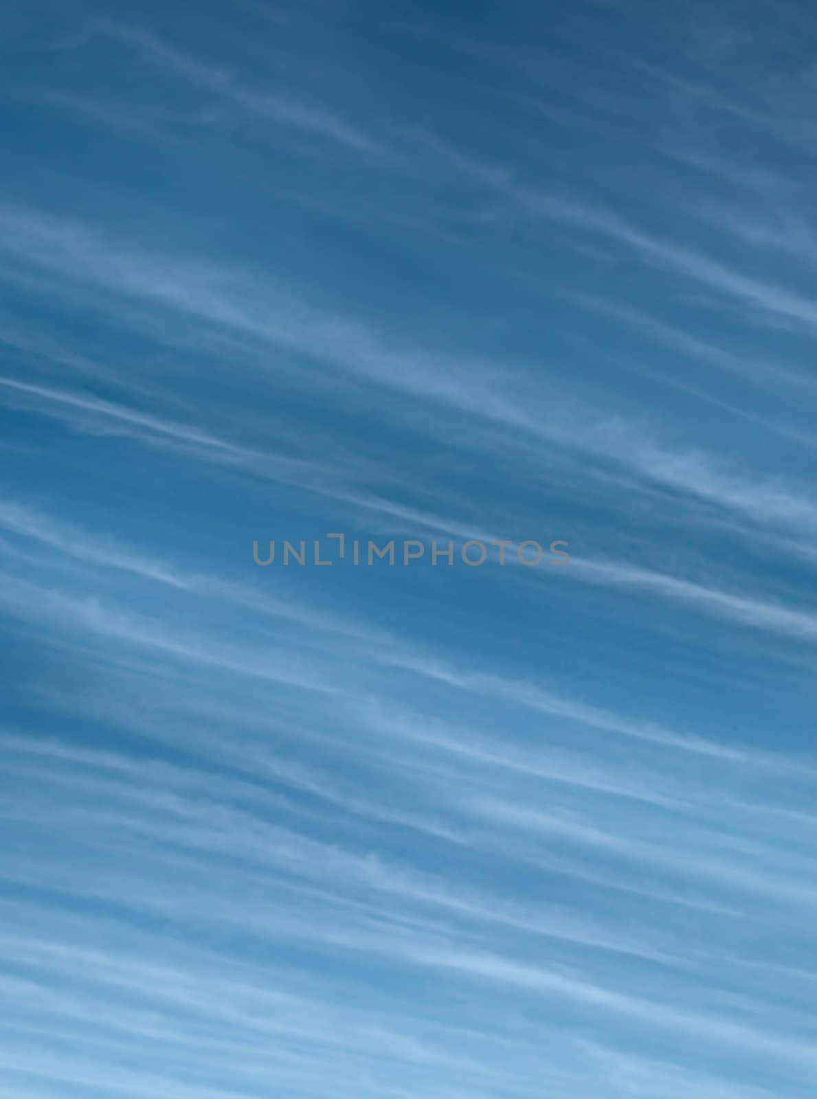 High level Cirrus cloud against blue sky meteorology weather  background