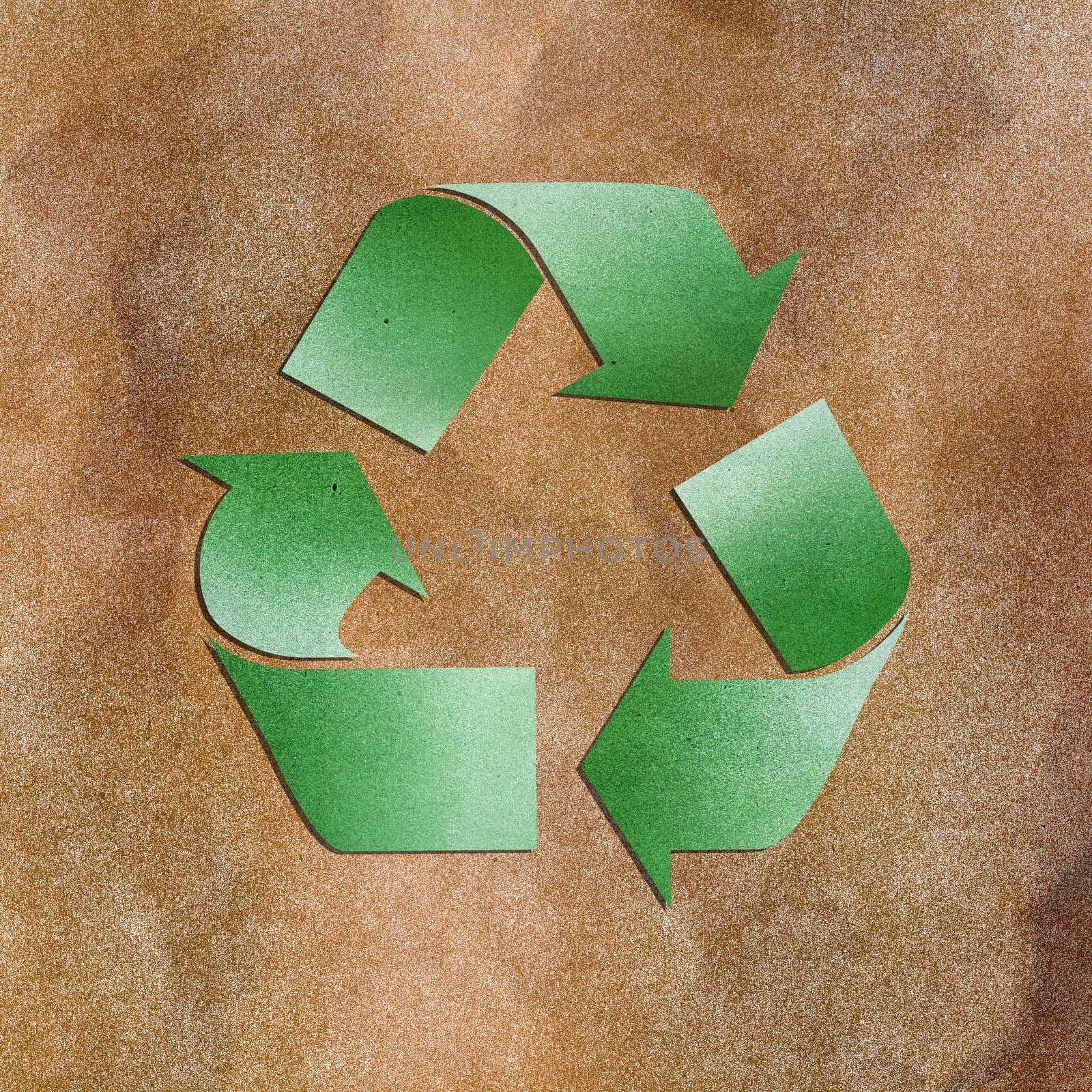 Grunge paper texture green recycle sign on brown background