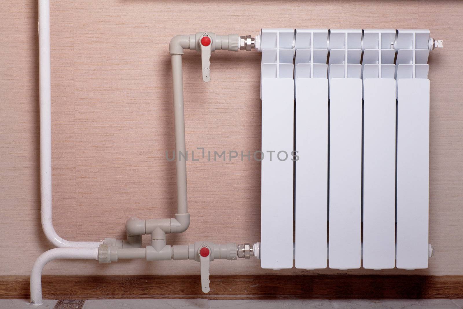 White clean radiator in a room